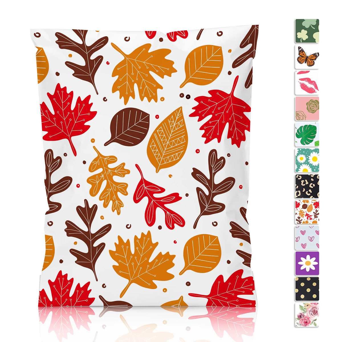 White poly mailer bag with red, orange, and brown maple leaves on a light background