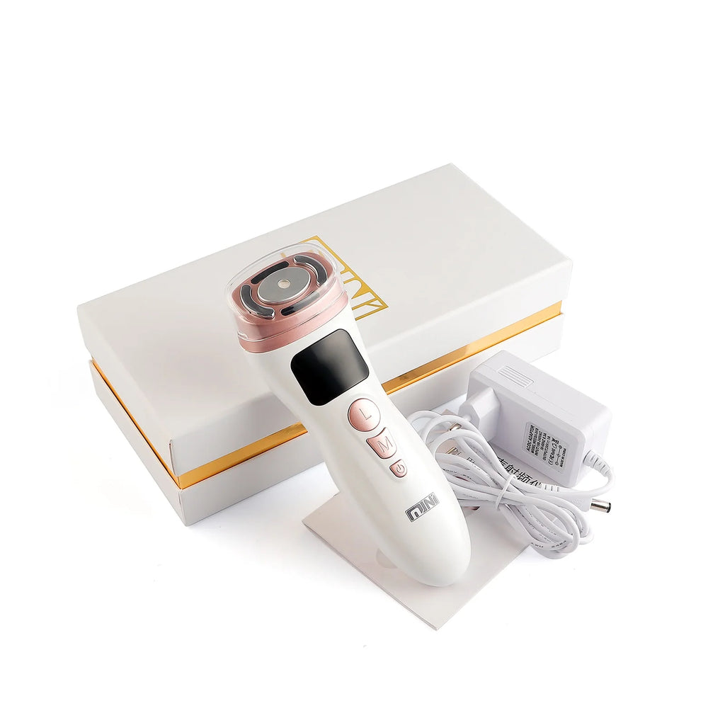 White and rose gold handheld HIFU facial tightening device with power cord and gift box on a white background.