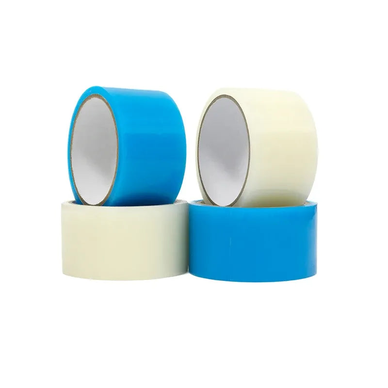 Self-adhesive repair tape rolls, blue and white, with paper backing