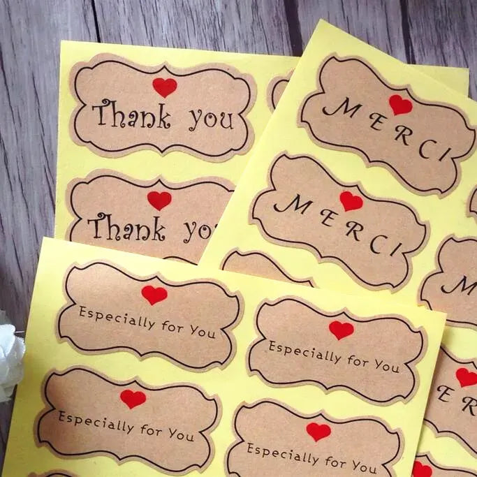 Kraft thank-you label stickers sheet with Thank you, MERCI, and Especially for You messages