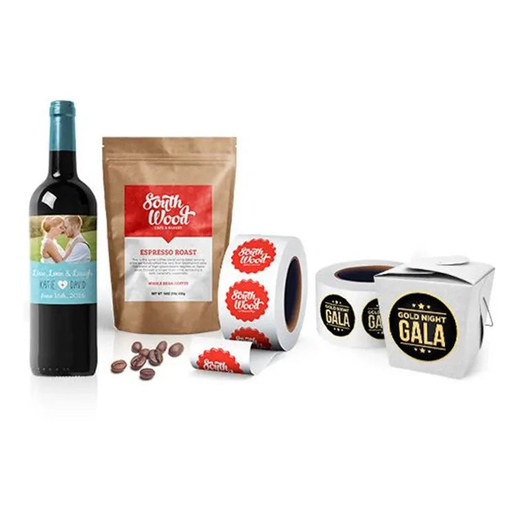 Printed label sticker rolls with coffee and gala designs, shown with bottles and pouches