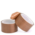 Brown PTFE-coated glass cloth tape rolls with white adhesive backing, hot-melt style