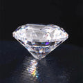 Pear-shaped lab-grown diamond with faceted facets and reflective highlights