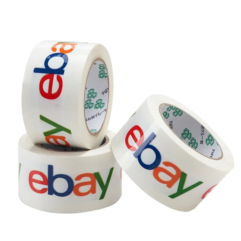 White packing tape rolls with colorful eBay logo print and visible inner core