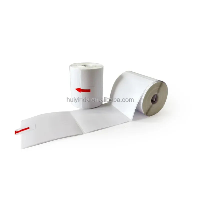 White thermal label roll with extended strip and two rolls on a white base