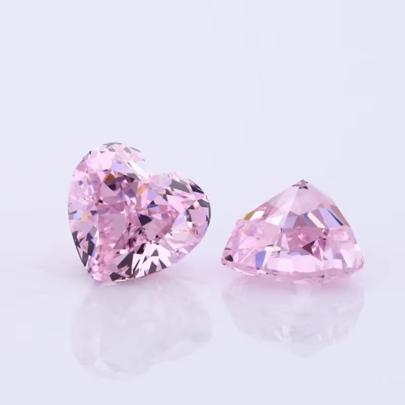 Pair of pink heart-shaped lab-grown diamonds, faceted loose stones