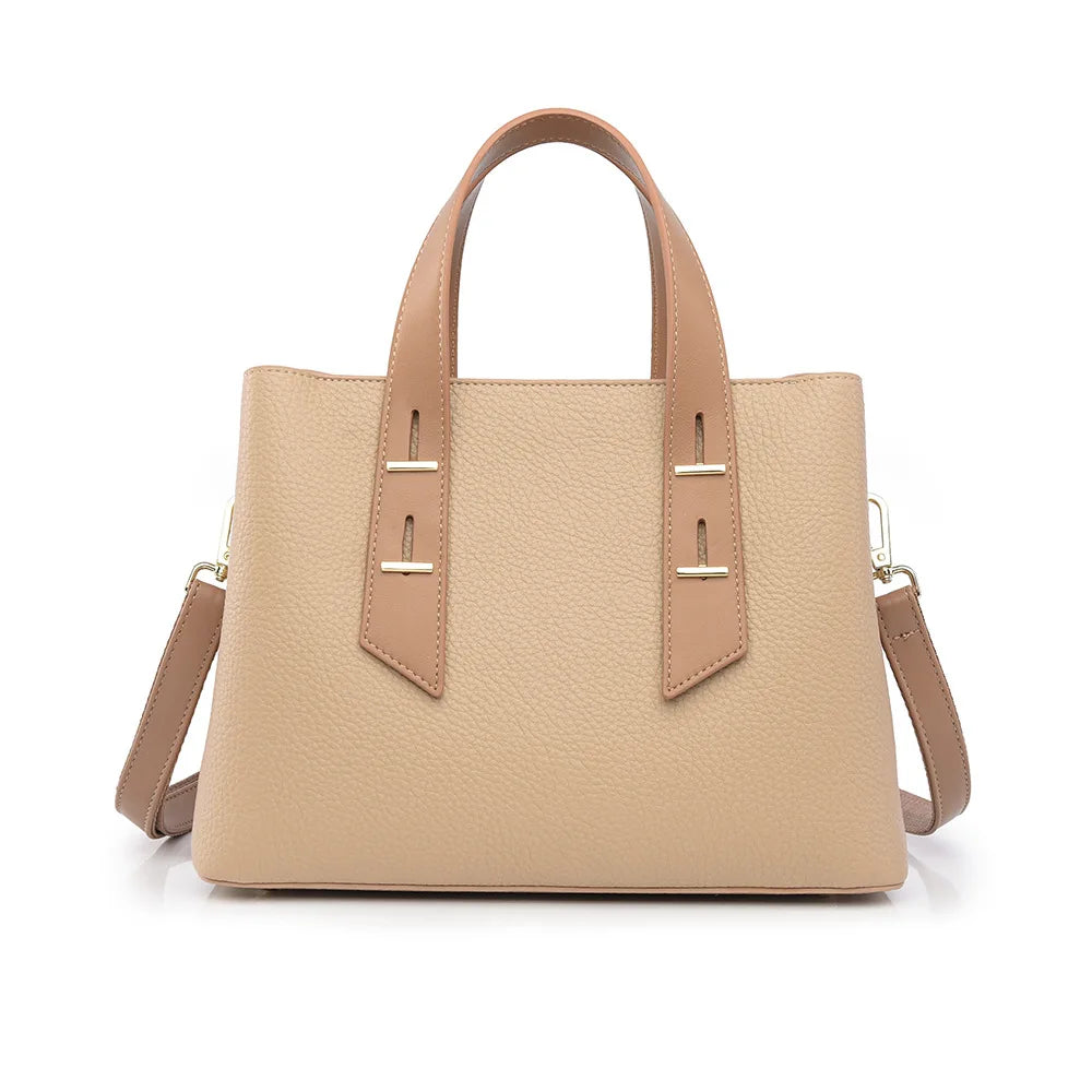 Beige pebbled leather designer handbag with dual top handles, gold hardware accents, and a detachable shoulder strap.