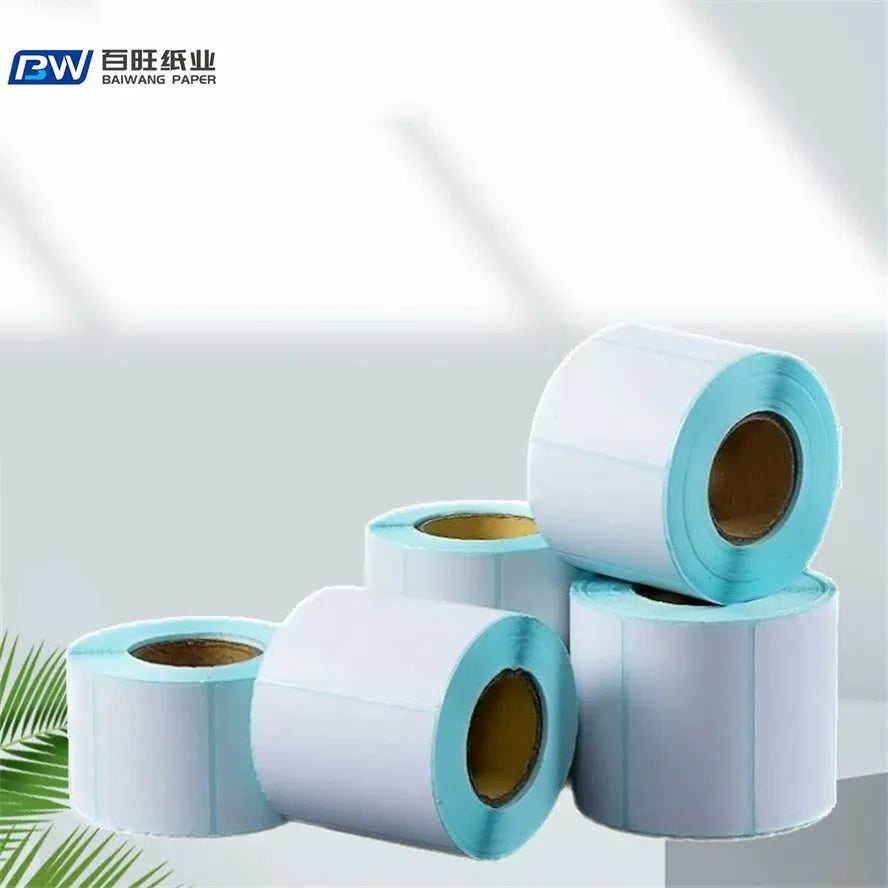 Adhesive label thermal rolls with blue inner cores, stacked assortment
