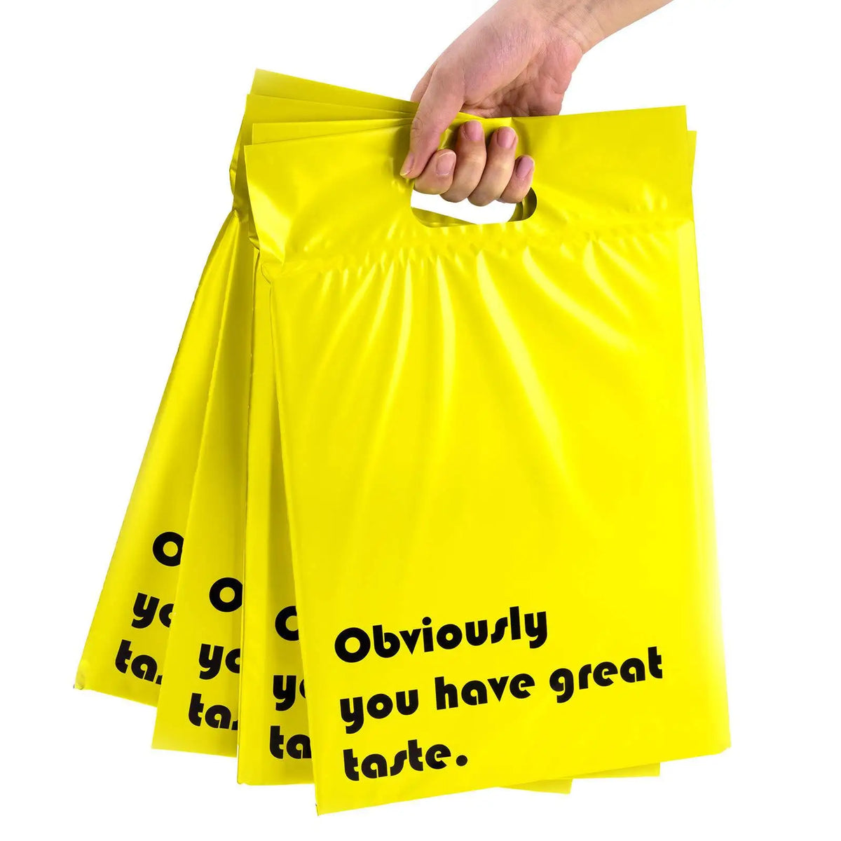 Yellow plastic mailer with cut-out handle and 'Obviously you have great taste' print.