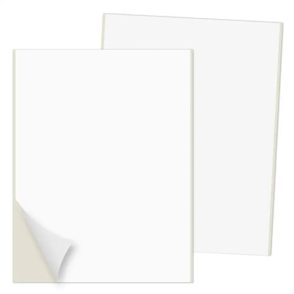 Matte white matte vinyl sticker paper sheets, two stacked with clean edges