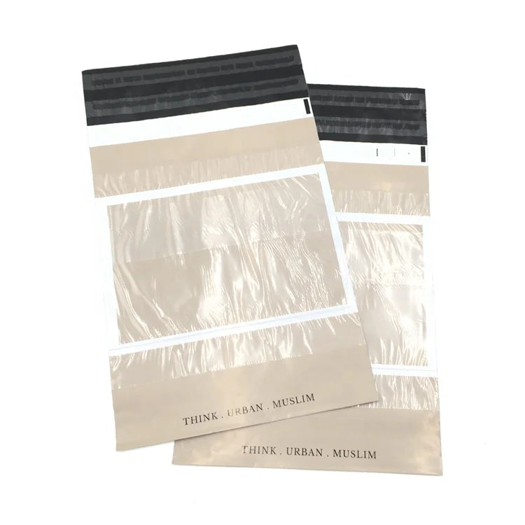 Cream poly mailer bags with black seal strip and "THINK URBAN MUSLIM" text at bottom