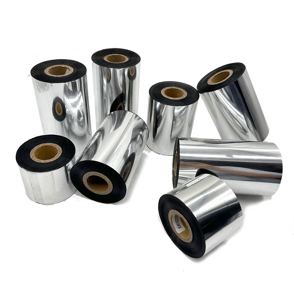 Assorted silver metallic vinyl sticker rolls with black cores and cut pieces