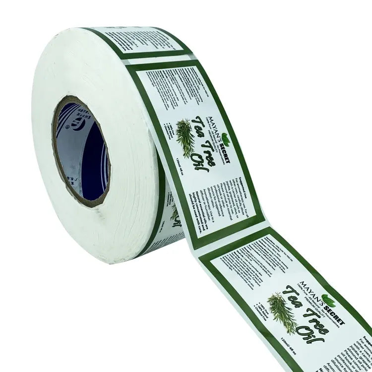 Glossy waterproof label sticker roll in green, angled with printed label panels