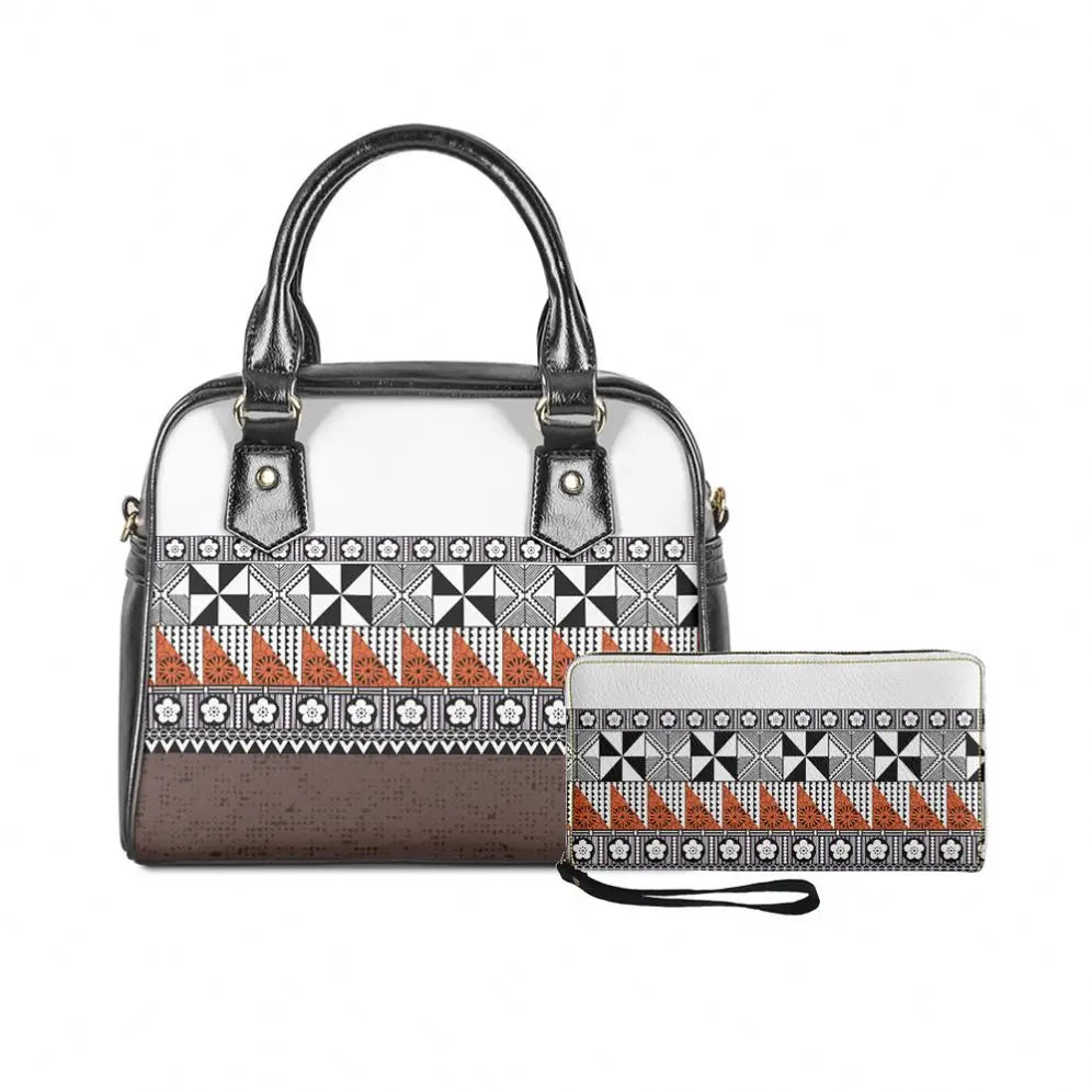 2-piece handbag and wallet set featuring black, white, and orange Polynesian tribal patterns and floral motifs.