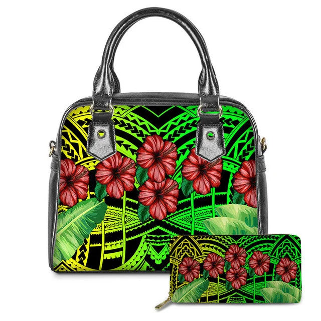 Leather handbag and wallet set with vibrant green tribal Polynesian print and red hibiscus flower design.