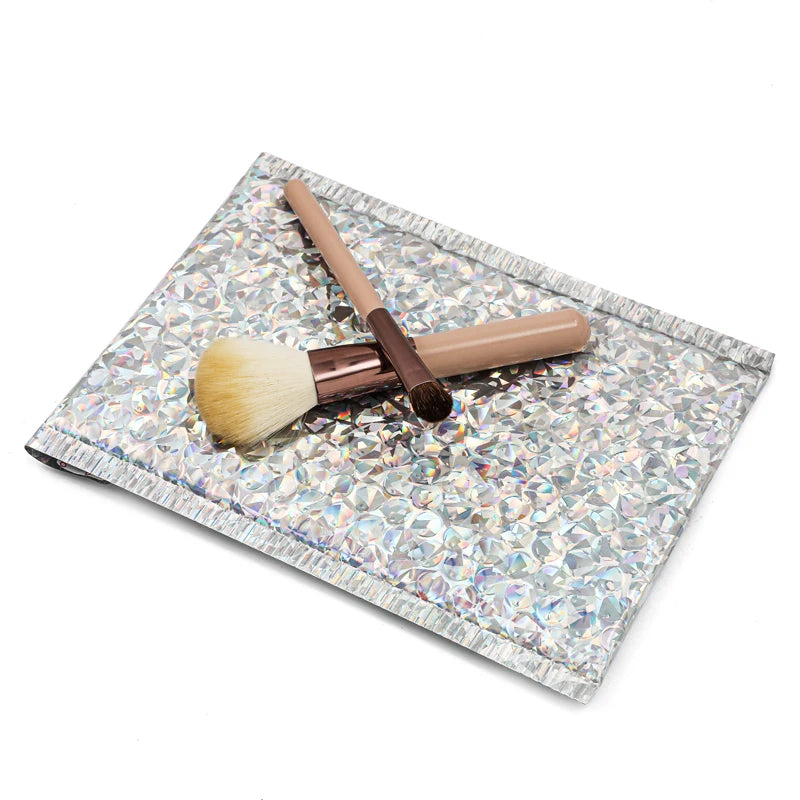 Holographic silver bubble mailer envelope with bubble texture and side seam