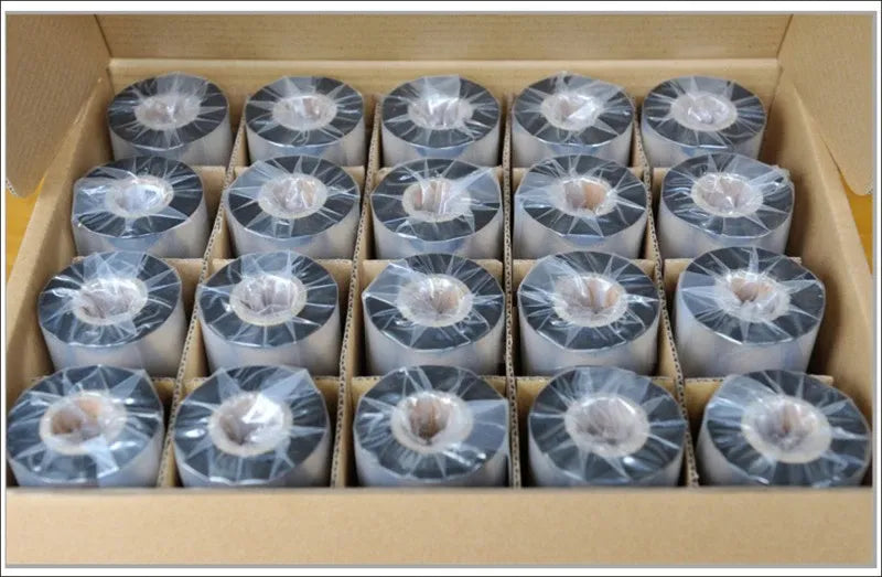 Thermal transfer ribbon rolls packed in cardboard box, each sealed in clear plastic