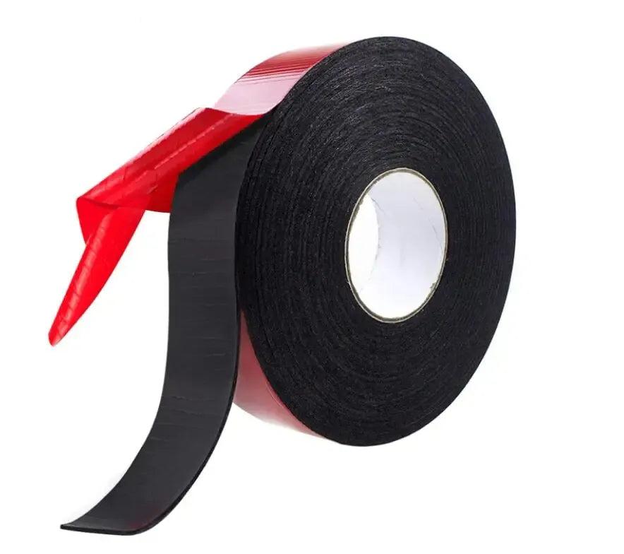 Double-sided heat resistant foam adhesive tape roll, black with red backing strip and liner