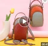 Two-tone genuine leather designer crossbody handbags in red and grey, featuring a compact vertical zip-top design.