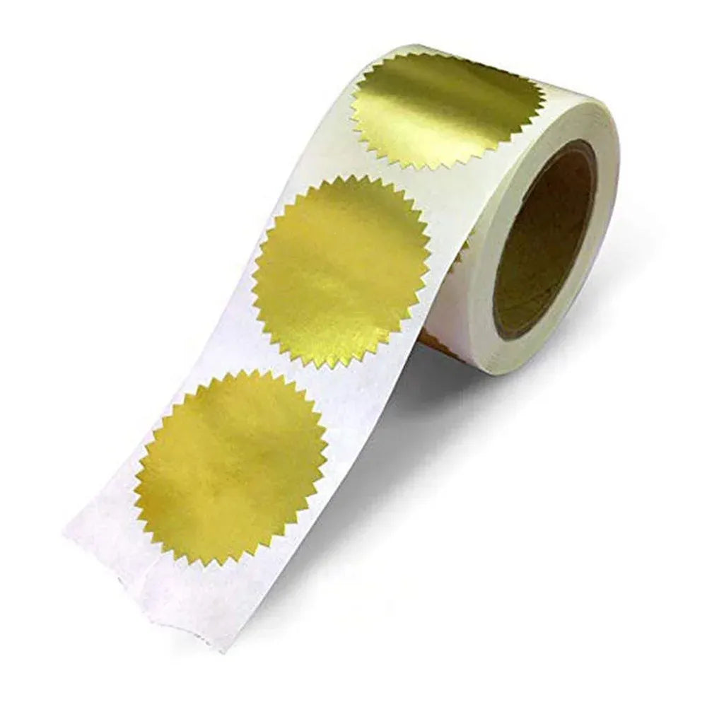 Gold metallic circular wafer seal stickers on a roll, with serrated edges