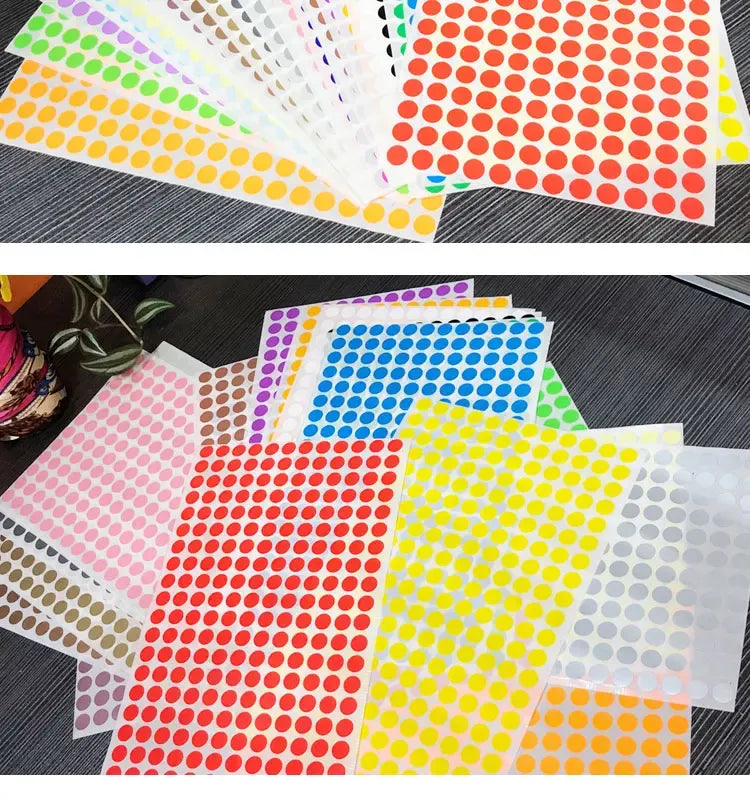 Assorted sheets of round dot stickers in red, blue, yellow, green, and pink