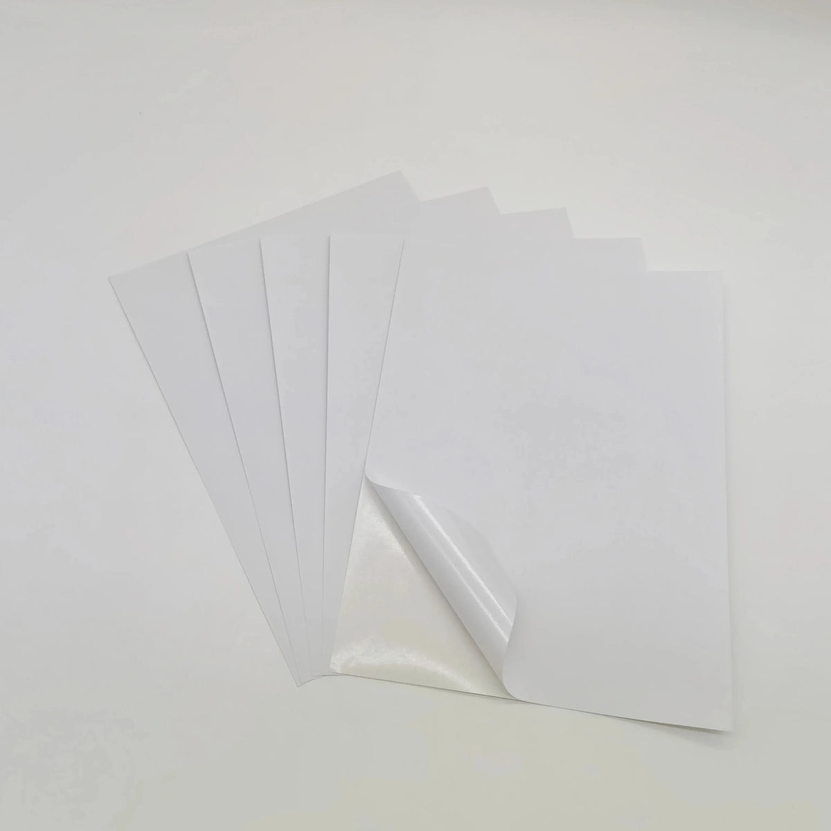 White A4 printable label sheets, multiple stacked sheets