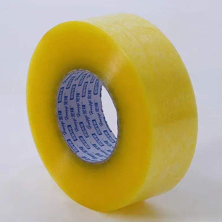 Single yellow packing tape roll with a printed label on the inner core