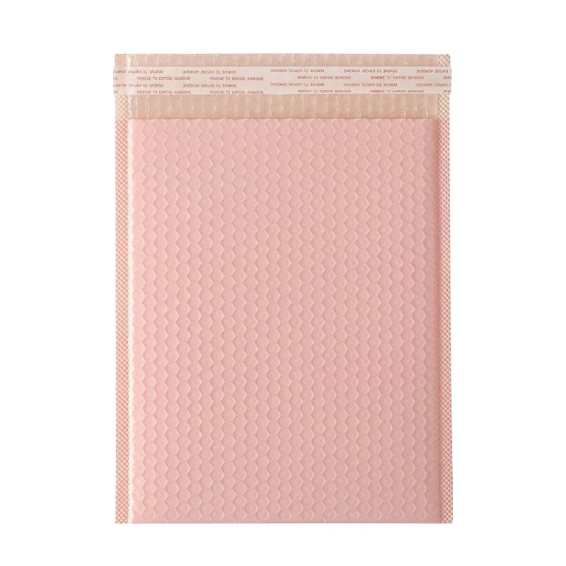 Pink self-seal air bubble mailer envelope, front view with top adhesive strip