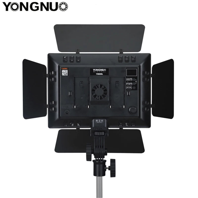 YN600L LED video light with four adjustable black barn doors, cooling fan, battery mounts, and a mounting bracket.