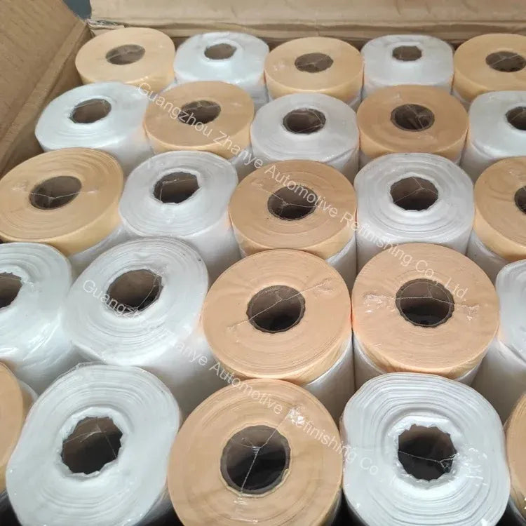 Assorted white and beige masking film rolls with cardboard cores