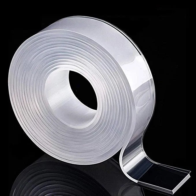 White double-sided mounting tape roll, 20mm wide, close-up on the coiled tape