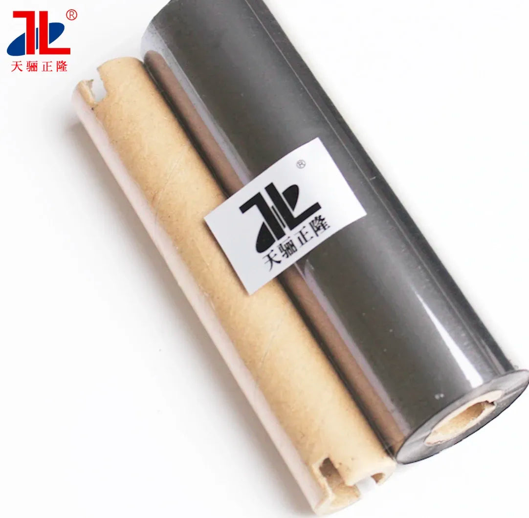 Thermal transfer resin ribbon rolls, silver and tan films with visible cores