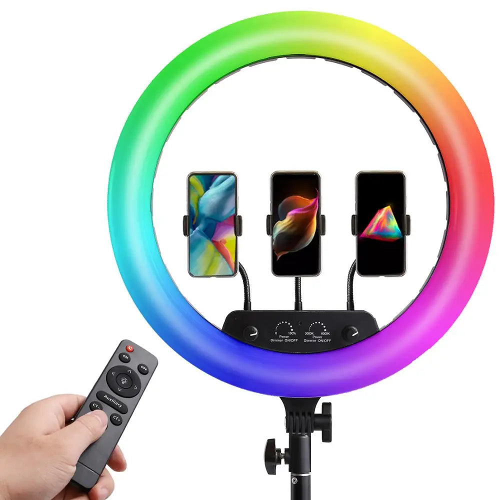 RGB ring light with three smartphone mounts and remote control for photography and video recording on a tripod stand.