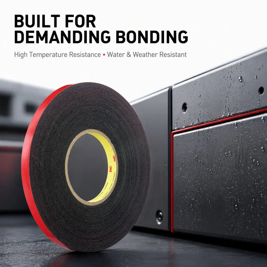 Double-sided foam tape roll with red edge near wet metal surface