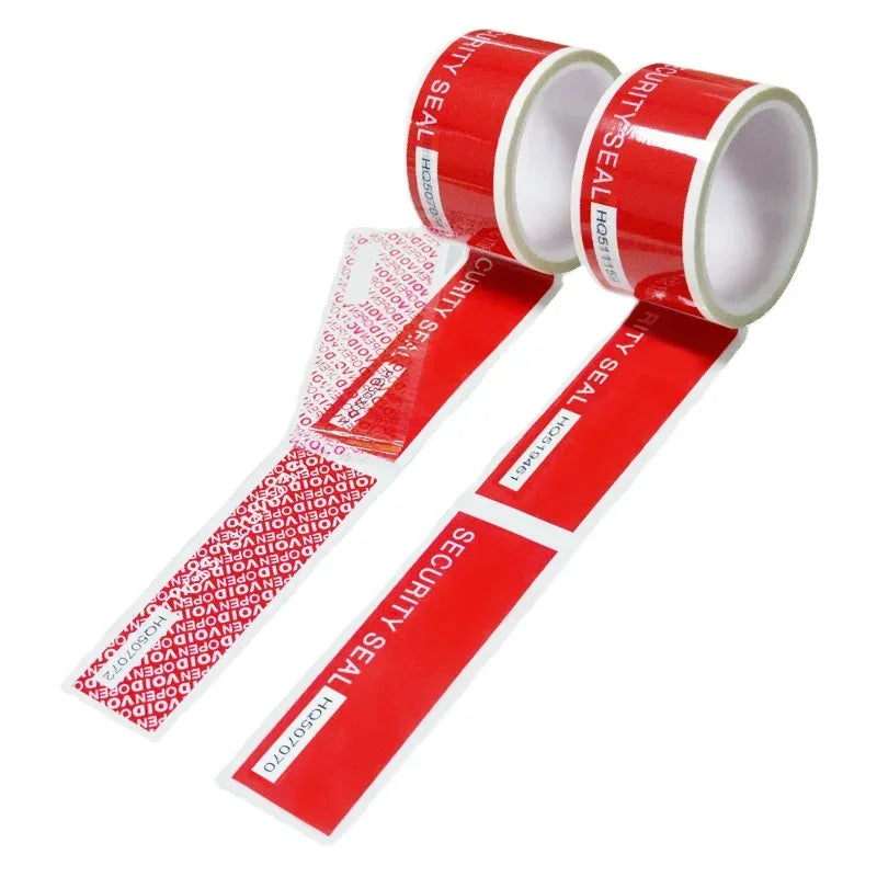 Red tamper-evident security seal void tape roll with printed VOID pattern strip