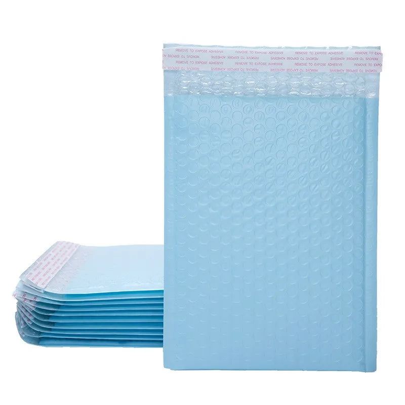 Blue self-seal air bubble mailer envelopes stacked, front envelope upright