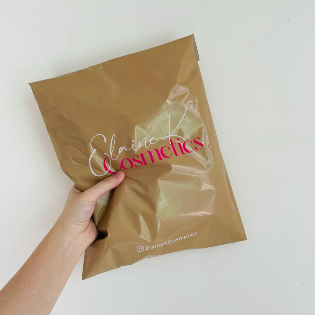 Tan poly mailer shipping bag with 'ElaineK Cosmetics' logo print