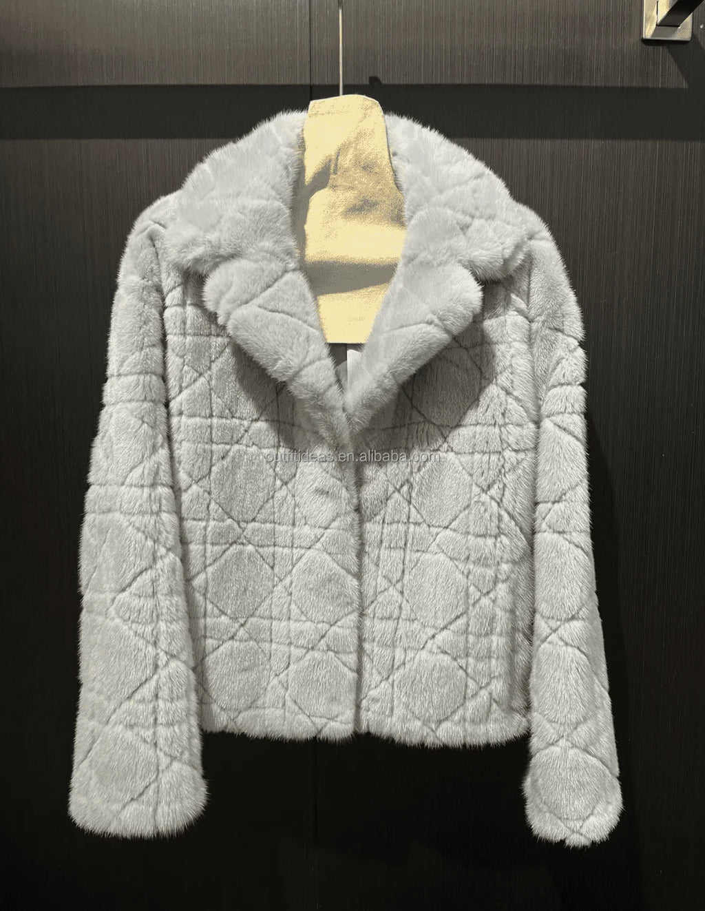 Luxury light grey quilted mink fur jacket with elegant geometric cannage pattern and notched collar.