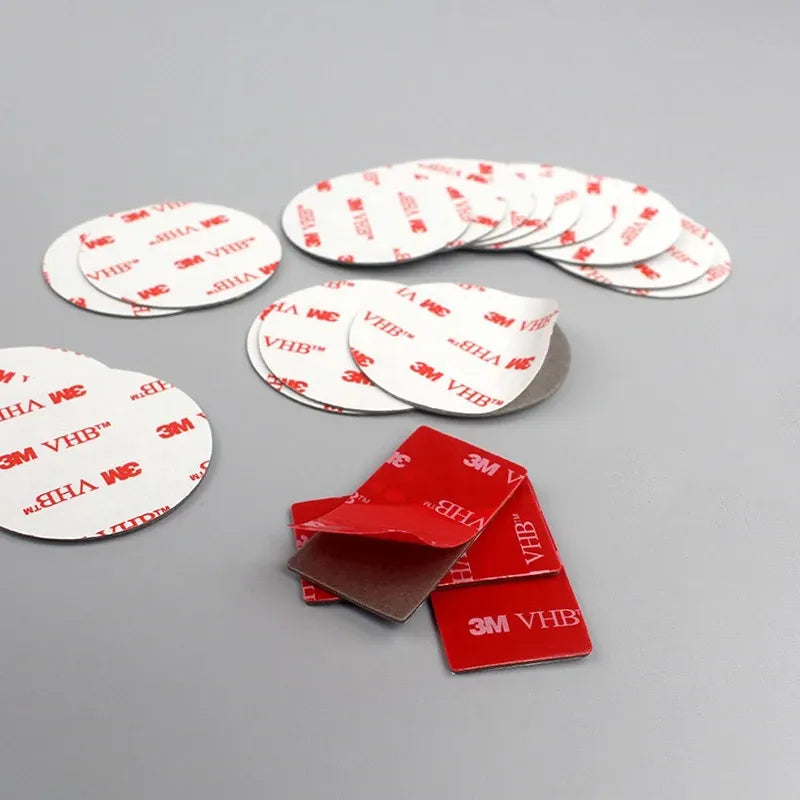 Red and grey die-cut double-sided acrylic foam tape pads, round shapes in a set