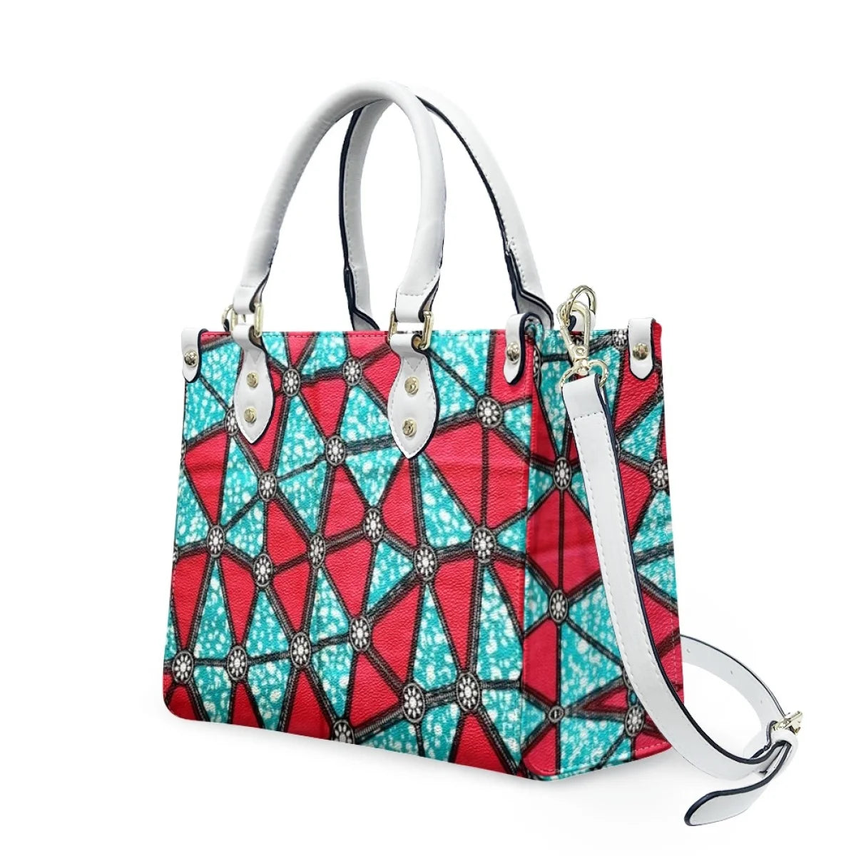Large leather handbag with red and teal Polynesian tribal geometric print, white handles, and detachable shoulder strap.