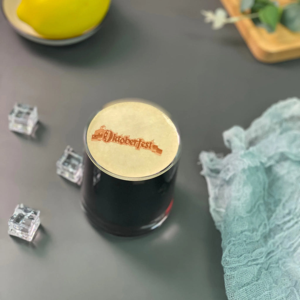 Black edible ink cartridge with round top label and small ink cartridge pieces