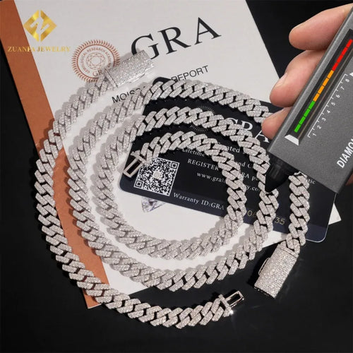 Icy white moissanite Cuban link chain necklace with pave-set stones, testing positive on a diamond tester with GRA cert.
