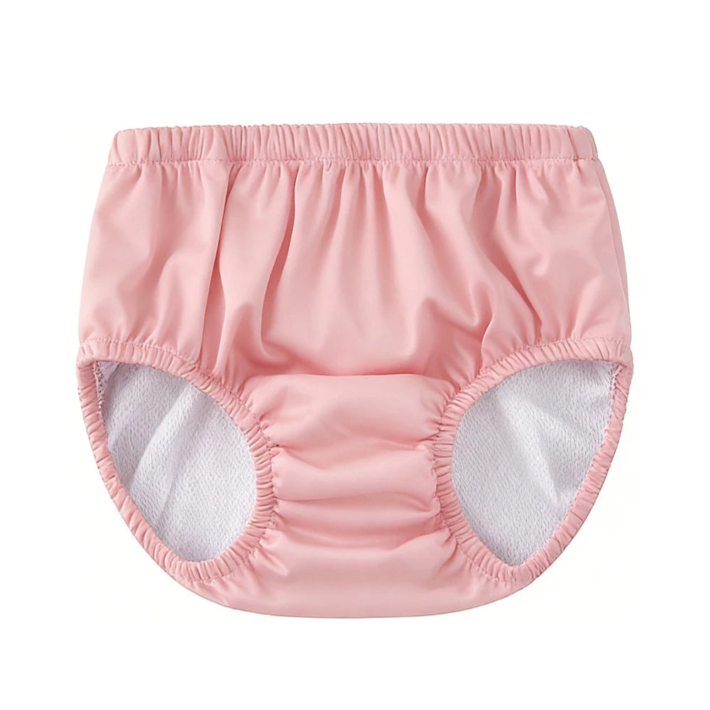 Pink waterproof baby swim diaper with elastic waistband and leg openings for leak protection.