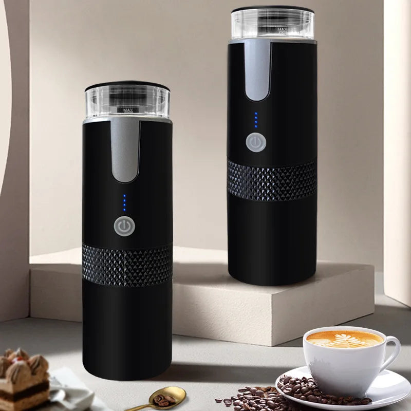 Two black portable electric coffee grinders with clear tops, LED power indicators, and textured grip bands on display.