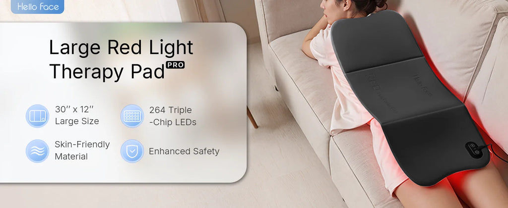 Hello Face L7 large red light therapy pad with 792 LED chips for full-body pain relief on a sofa.
