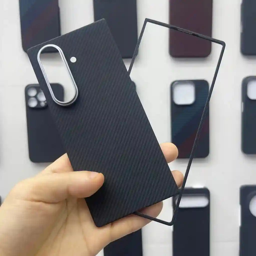 Black carbon fiber-style rectangular phone case with silver camera cutout for Samsung S24 Ultra protection.