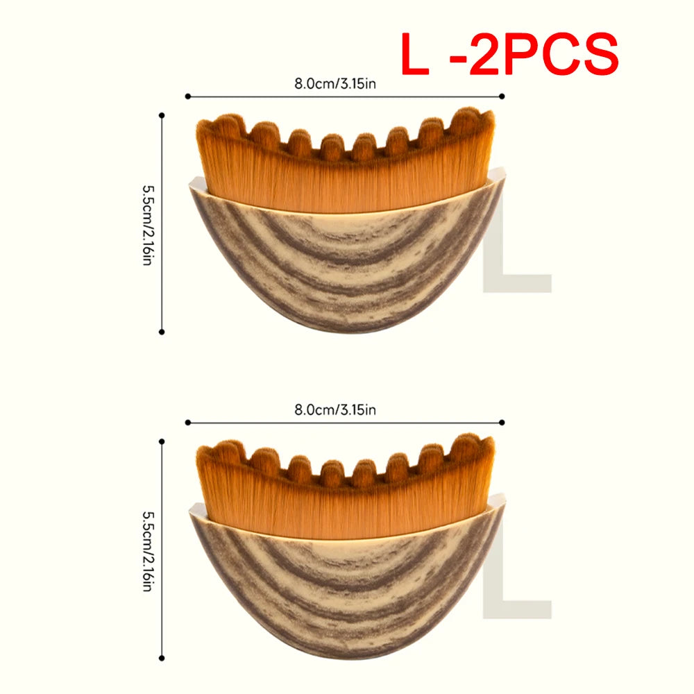 Two curved lymphatic contour face brushes with brown bristles and wood-grain handles, showing dimensions of 8cm x 5.5cm.