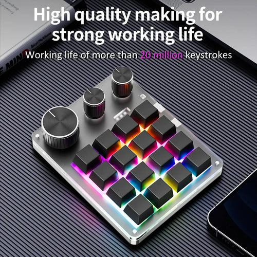 16-key custom mechanical macro keypad with three control knobs, RGB lighting, and a sleek silver frame.