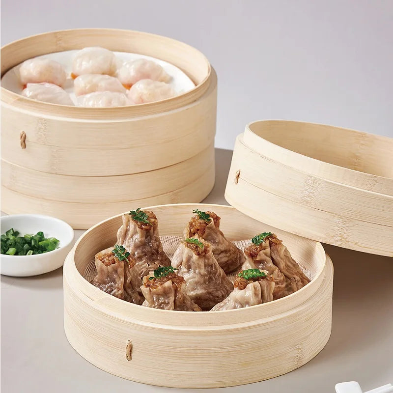 2.2L double-layer bamboo steamer electric cooking pot with upper basket filled with meat