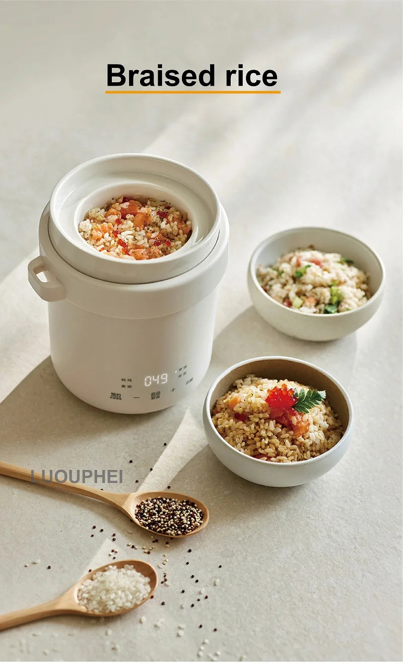 White electric rice cooker pot with lid and bowls of cooked rice
